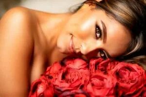 Beautiful Woman Holding Roses
