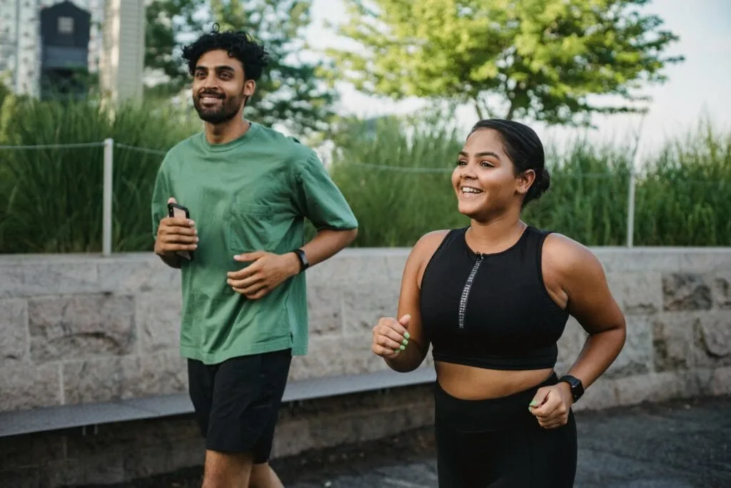 The Powerful Role of Hormones in Sexual Health: What You Need to Know 12 Man and Woman Smiling While Jogging Together